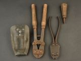 three old tools that are sitting on a table