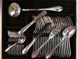 silverware in a box with spoons and spoons in it