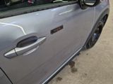 a car that has a sticker on the side of it