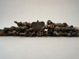 an image of a pile of mushrooms sitting on top of a white surface
