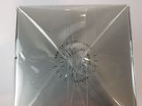 a clear plastic bag with a clock inside of it