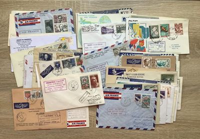 many different types of letters and envelopes laid out on a table