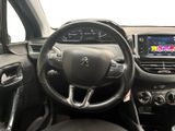 the interior of a car with a steering wheel and dashboard controls