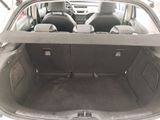 a trunk of a car with the back seats folded down