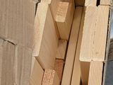 many pieces of wood stacked on top of each other