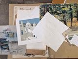 several pieces of art are sitting on top of a table