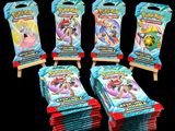 un lot de six paquets de cartes Pokémon empilés les uns sur les autres