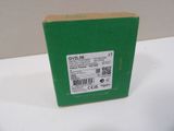 a green box that is sitting on a white table