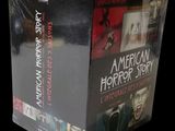 an american horror story dvd box set on a black background