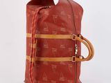 an image of a red bag with a horse pattern on it