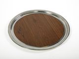 silver plate with a wooden surface on a white surface