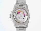 wrist watch with a silver bracelet and a rainbow dial on a white background