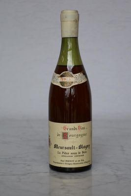 a bottle of wine that is sitting on a table