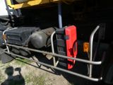 an image of a truck with luggage strapped to the back of it