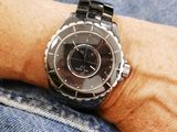 a person that is wearing a watch on his wrist