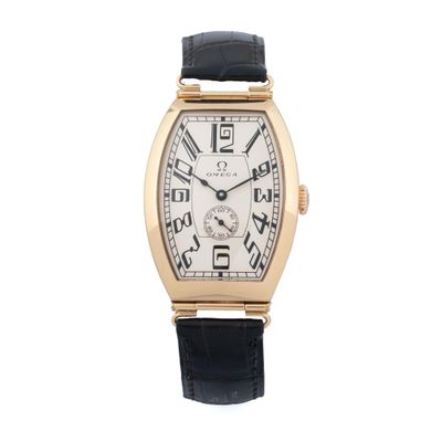 an image of a gold wrist watch with black leather strap