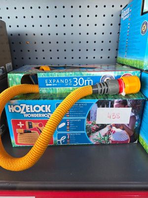 a hose that is attached to a box on the shelf