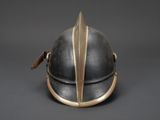 a close up of a helmet on a gray surface