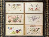 an old picture of a picture of birds and flowers in a frame