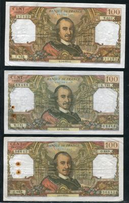 trois billets de banque différents, dont l'un porte l'effigie d'un homme