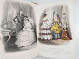 an open book with a picture of a woman in a wedding dress and a man in a suit and tie