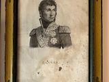 pair of framed portraits of a man and a woman in military clothing