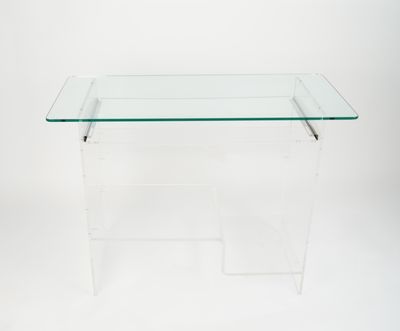 a clear table with a glass top on a white background