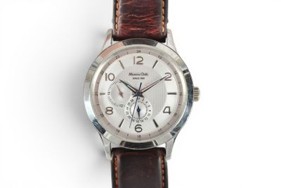 an image of a close up of a wrist watch on a white surface