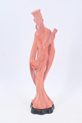 Figurine en porcelaine à l'imitation du corail figurant joue…