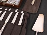 a table with silverware and silverware on it
