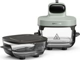 two pieces of glass food containers with lids and lids on a white background