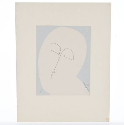 une image représentant le dessin du visage d'un homme sur une feuille de papier