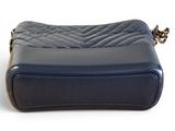 navy blue quilted purse with gold chain strap