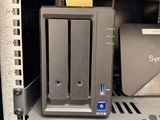 a picture of a rack with a hard drive and a hard drive