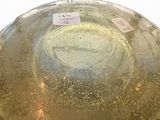 a glass bowl with a label on it