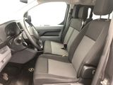 the interior of a car with a steering wheel and a dashboard