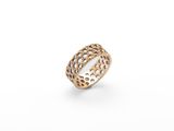 a gold plated ring with holes and holes in the middle