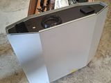 a box with a computer inside of it sitting on the floor