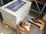 a box that is sitting on a pallet in a warehouse