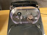 a blender that is sitting on a table next to a cup