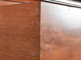a wooden box that has a handle on it