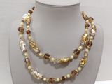 multicolored glass beaded necklace on a mannequin display