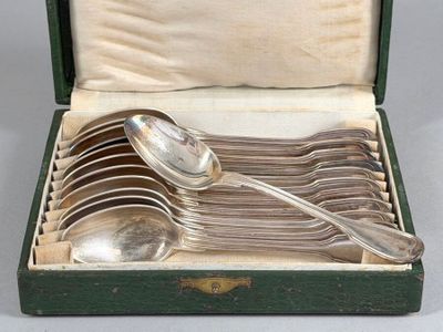 a box with a set of silver spoons and spoons in it
