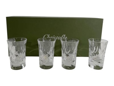 set of four crystal shot glasses in a gift box