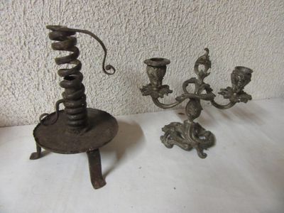 two candles that are sitting on a table