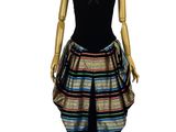 a mannequin dressed in a black and multicolored dress