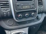 the interior of a car with a steering control and dashboard controls
