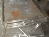 a large metal grill in the middle of a kitchen