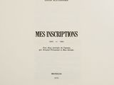 a close up of a book with a black and white cover