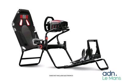 a close up of a video game chair with a remote control